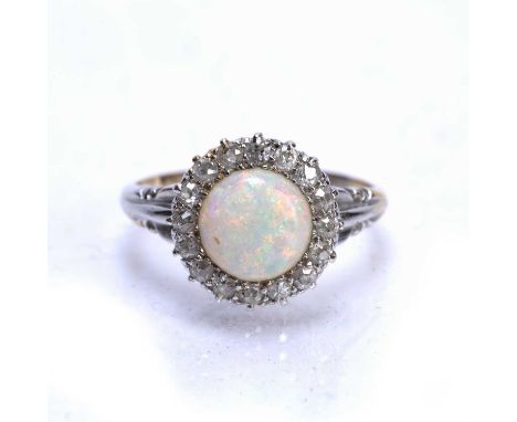 Opal and diamond cluster ringon yellow precious metal band with rubbed marks, size M, 4g approx overallCondition report: At p