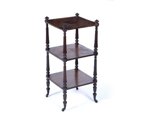 Rosewood Gillows style three tier whatnot19th Century, with reeded columns and finials on original brass castors, 35cm square