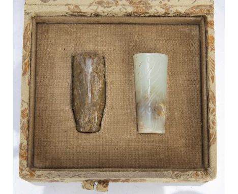 Two jade carvingsChinese, each with engraved decoration, each 4.5cm long in a lined caseCondition report: General wear but no