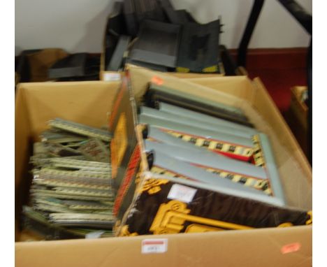 Three boxes containing a quantity of Hornby 00 gauge track, rolling stock and accessories 