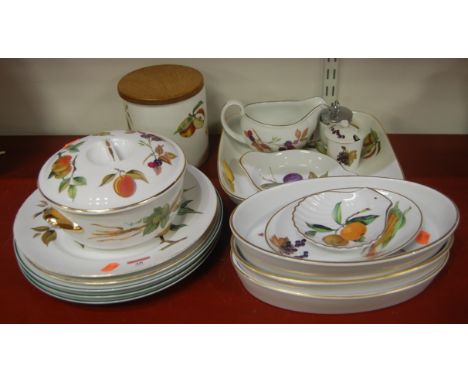 A quantity of Royal Worcester Evesham pattern table china to include plates, tureen and  cover, storage jar, oval dishes etc