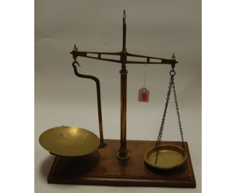 A W&T Avery Ltd of Birmingham brass balance scale on mahogany plinth