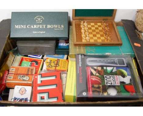 A box of assorted children's toys and games to include travel chess set, mini carpet bowls, Happy Families card game etc