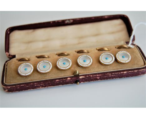 A set of six enamel buttons, each button approx. 12.5mm diameter, of white enamel and yellow metal, set with a faux turquoise