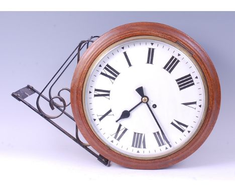 An early 20th century mahogany single fusee double-sided GPO dial clock, the twin white enamel dials each having Roman numera