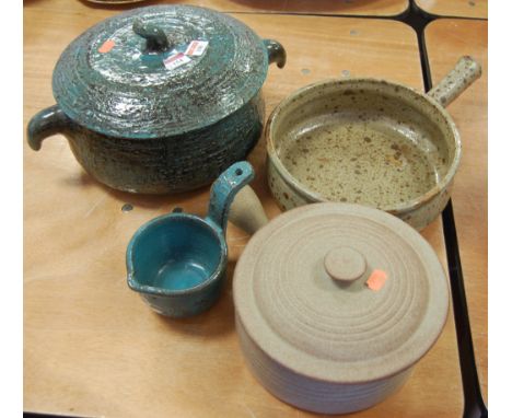 A 1970s stoneware tureen and cover, on a mottled blue/brown ground, with matching ladle; and two other stoneware pans