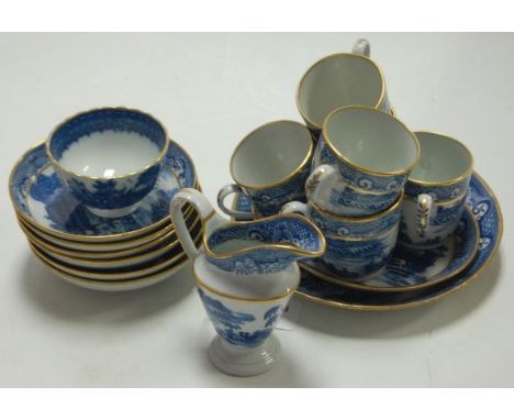 A late 18th century English porcelain blue and white part tea and coffee set, possibly Caughley, comprising six coffee cans, 