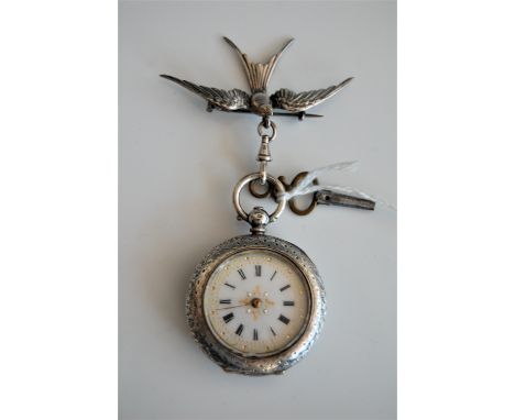 A lady's Swiss silver fob watch and bird swallow brooch, the round white enamel and gilt decorated dial, with black Roman num