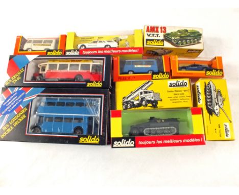 Ten boxed Solido models including buses and military vehicles