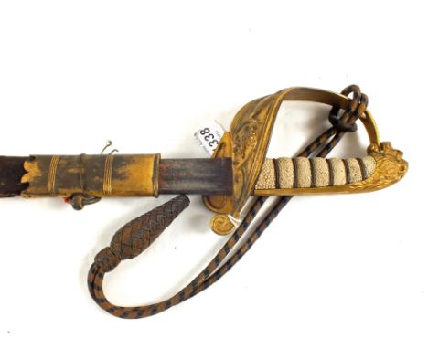 A Victorian scare pipe back Naval Officer's sword with scabbard, as found