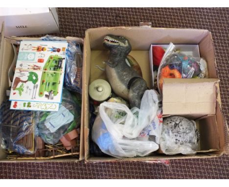A dinosaur and other plastic models including two ceramic skulls (two boxes)