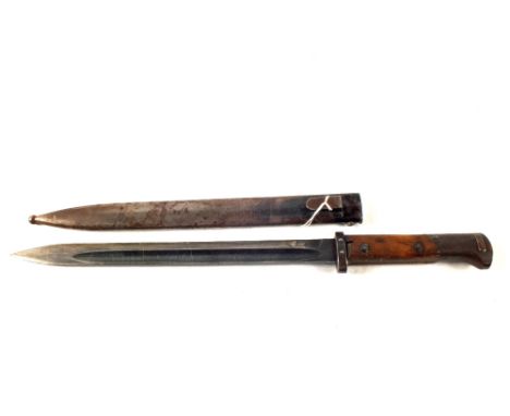 A bayonet with scabbard for a Mauser rifle