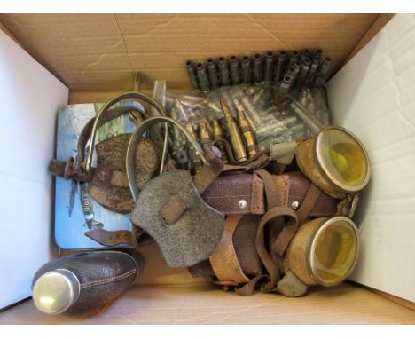 A mixed lot including early flying goggles, leather ammunition pouch and a Dixon hip flask