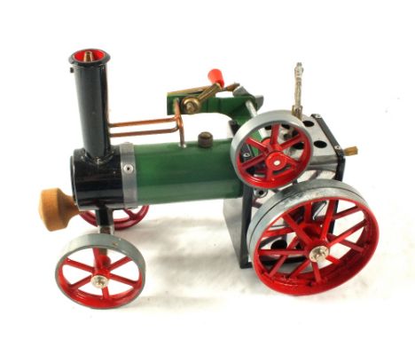 A Mamod steam tractor and trailer