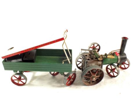 A Mamod steam tractor and trailer