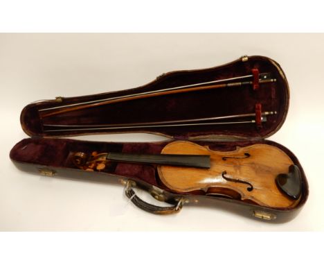 A one piece back violin 34.75cm bearing label to the interior "Caspar da Solo in Brescia" a violin bow bearing a makers mark 
