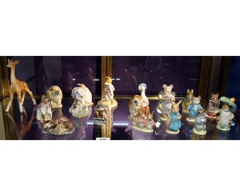 A collection of Beswick Beatrix Potter figures including Flopsy Mopsy and Cotton Tail, Old Mr Brown, Gemima Puddleduck, two L