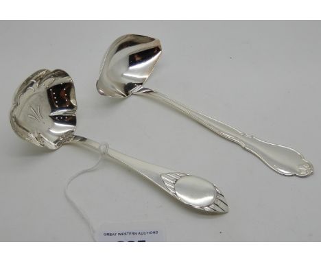 A lot comprising a Danish silver sauce ladle and a Danish silver sifter ladle, 96gms, 17cm long and 15.5cm long Condition Rep