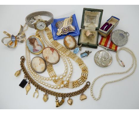 A nursing medal, a 9ct gold signet ring weight 3gms, silver and white metal mounted  cameos etc Condition Report: No conditio