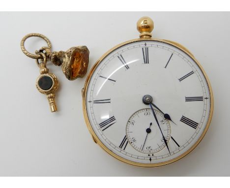 An 18ct gold open face pocket watch with white enamel dial with subsidiary seconds dial and blued steel hands, diameter of th