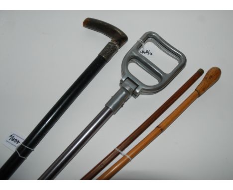 A ebony walking cane, a keg measure, bamboo cane and Featherwate shooting stick (4) Condition Report: Available upon request