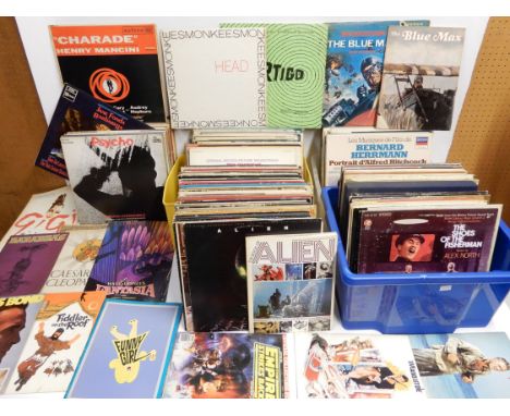 A rare collection of over 220 movie soundtrack vinyl L.P records together with 150 movie brochures many matching, from the 19