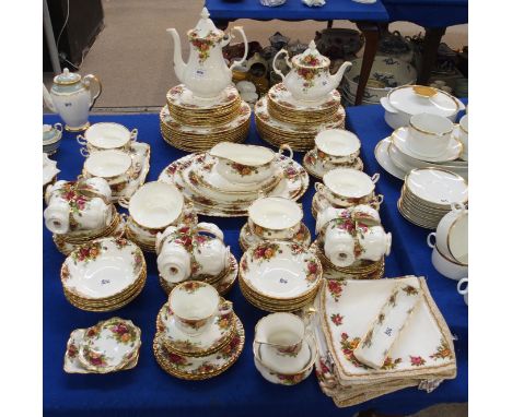 An Extensive Royal Albert Old Country Roses dinner service comprising eighteen dinner plates, medium sized plates and coffee 