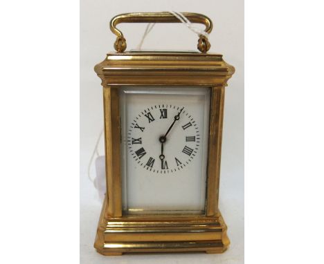 A miniature brass carriage clock Condition Report: Available upon request