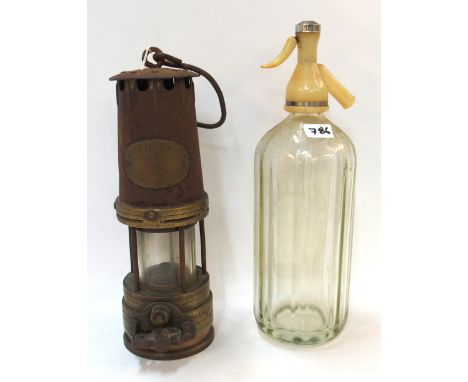 A Schweppes soda syphon and a miners lamp Condition Report: Available upon request