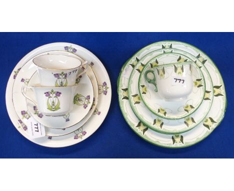 Two Paragon china trios with Art Nouveau style decoration of tulips in purple and green together with a cakeplate and opal ar