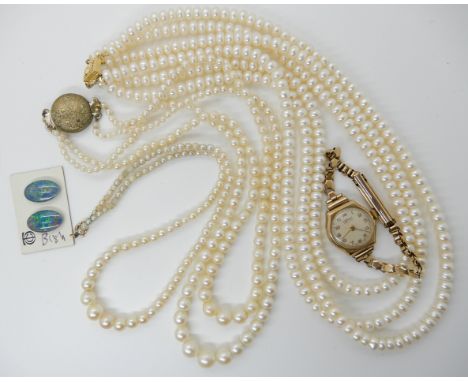 A 9ct cased ladies Vertez watch, strings of cultured pearls and two unmounted opal triplets Condition Report: Available upon 