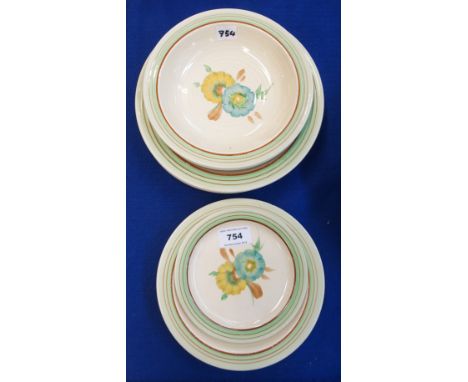 A Clarice Cliff for Newport pottery flower painted bowls and plates Condition Report: Well rubbed to decoration. 