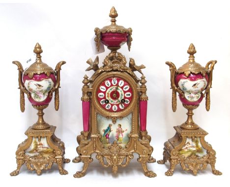 A clock garniture comprising clock and two decorative urns, the pin and white porcelain dial with Roman numerals with ormolu 