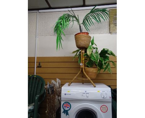 Modern bamboo planter stand and a wooden stepladder