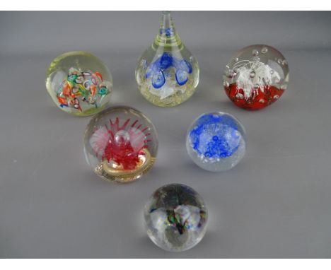 Six vintage paperweights with bubble splash inclusion (one damaged to tip)