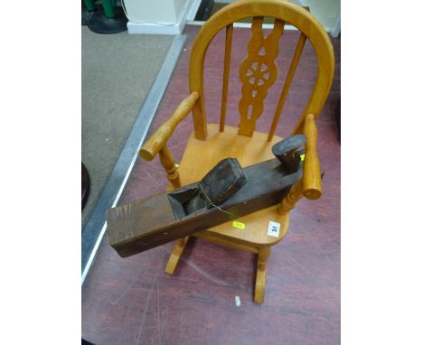 Small light wood rocking chair and a vintage wooden block plane