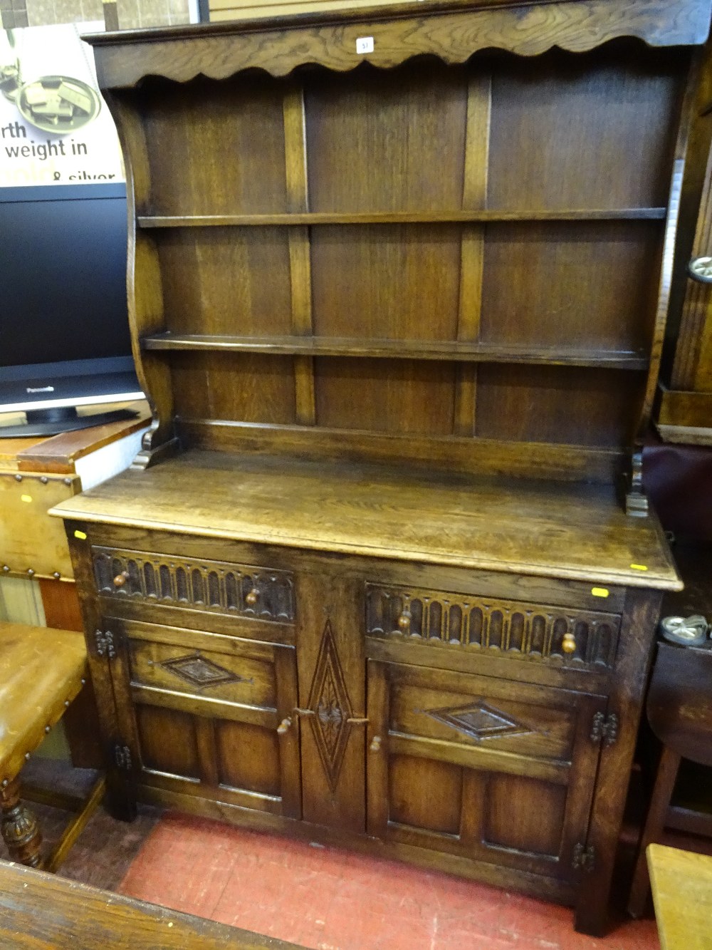 Excellent oak Priory style dresser with two drawers over two base cupboards