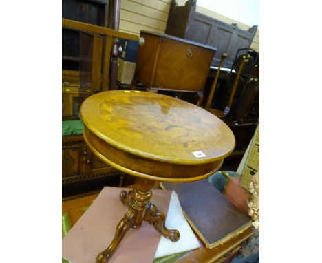 Circular occasional table with single drawer on turned pedestal and tripod carved supports