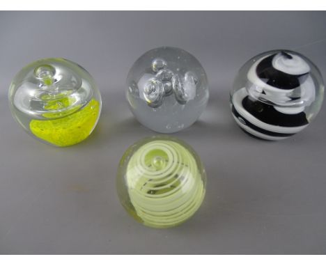 Four interesting vintage paperweights, three of large format with bubble decoration, the other having a vaseline glass type s