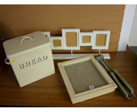 Metal bread bin, standing multi-portrait frame, a small wooden easel and a painted display case