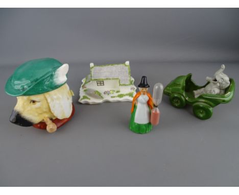 Coalport cottage, ceramic tobacco jar and cover in the form of a dog and two further novelty items of vintage china
