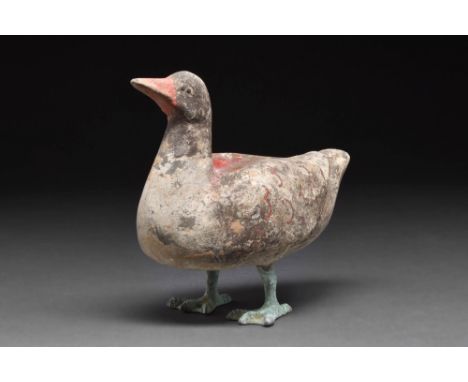 Ca. 202 BC - AD 220.A terracotta duck with a hollow, rounded body that tapers towards the tail. The head is raised and slight