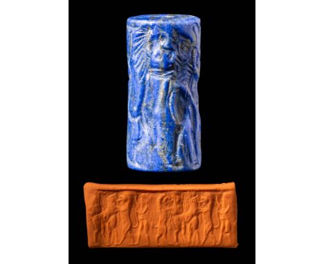 Ca. 2300 - 2200 BC. A lapis lazuli cylinder seal depicting a naked hero and lions attacking a buffalo. Studied by PD Dr. habi
