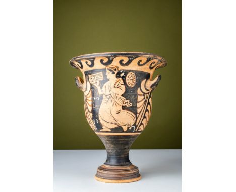 Ca. 400 - 350 BC. A red-figure bell krater with an inverted bell-shaped body, a broad, flaring rim, and a stemmed foot that e