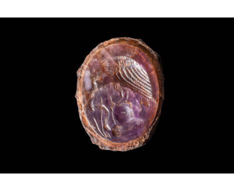 Ca. 400 - 300 BC.A fine amethyst seal with the remains of its original bezel, engraved with a depiction of a vulture grasping