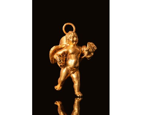 Ca. 300 - 200 BC. A gold pendant depicting a standing figure of Eros with detailed facial features, short wavy hair, and outs