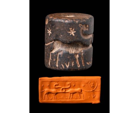 Ca. 3300 - 2900 BC. A cylinder seal depicting two mythical creatures amid stars and floral motifs. Studied by PD Dr. habil. P