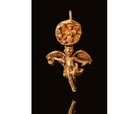 Ca. 300 - 200 BC. A stunning gold earring featuring the upper section consisting of a rosette with a raised central boss enci