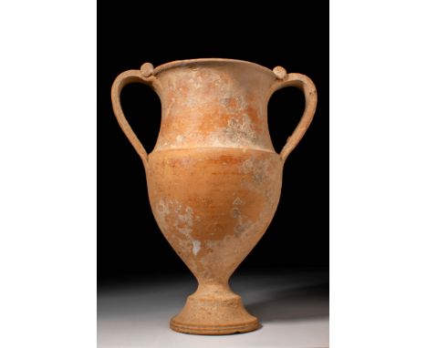 Ca. 400 - 200 BC. A pottery krater with a tall, rounded body tapering towards a flared pedestal foot. The wide, cylindrical n