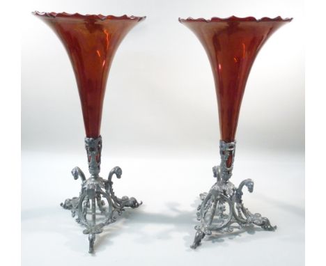 PAIR OF VICTORIAN RUBY FLASH TRUMPET SHAPED CUT GLASS VASES ON ORNATE PEWTER TRI-FOOTED BASES (H: 39 cm)